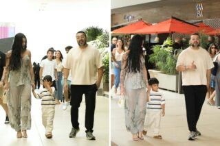 Belo é flagrado em passeio com namorada e enteado no Rio